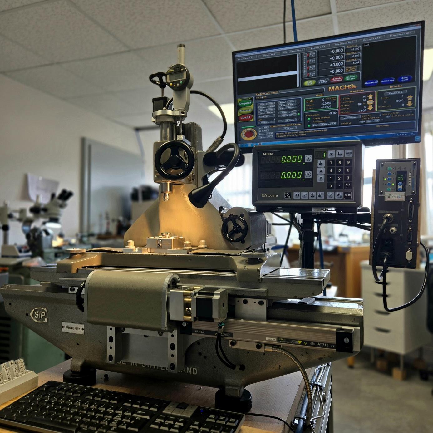 Machine SIP avec visualisation Mitutoyo affichant les coordonnées.